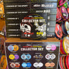 Discraft Buzzz and Inovna ROC Worlds Edition Collector Set packaging displayed on a retail shelf, with multiple black collector set boxes stacked behind and a circular set insert card below.