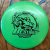 A bright green Innova Disc Golf Destroyer distance driver disc golf disc, featuring a black graphic of a robot and the model name 'DESTRUTOR', resting on a wooden surface.